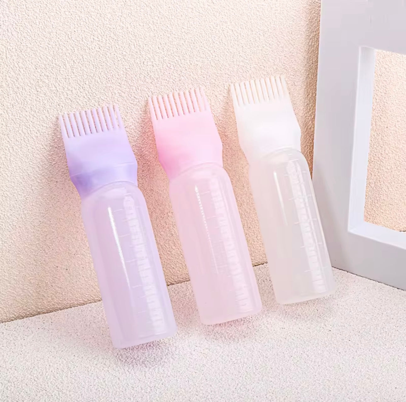 عبوة توزيع زيت الشعر وماسك السدر – برأس مشط